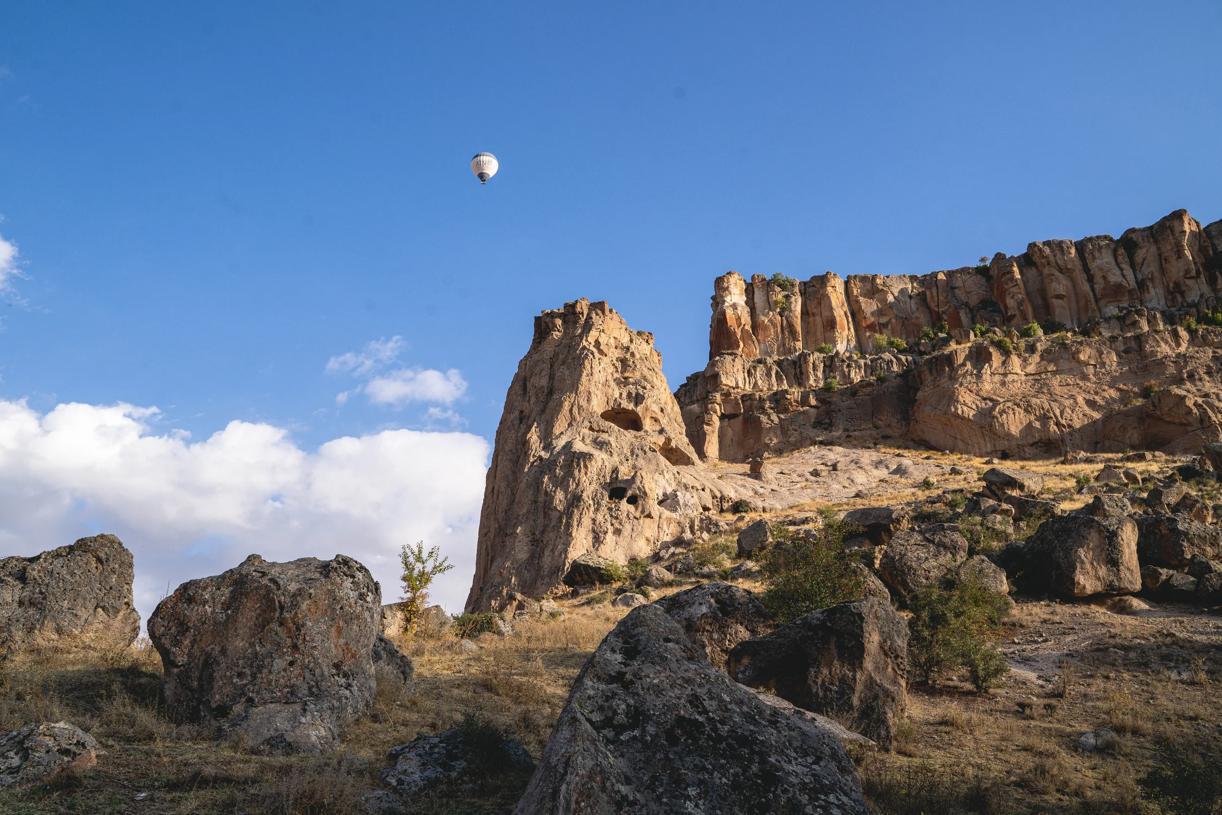 Hot air balloon flying above Ihlara Valley in Cappadocia